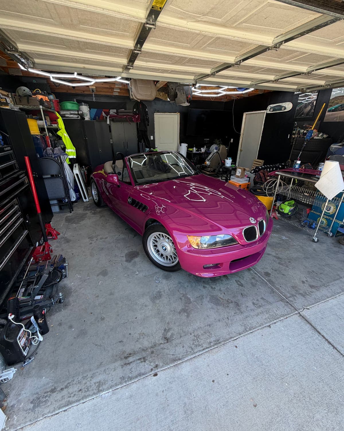 The garage shop in Redding, with a wrapped Z3 inside.